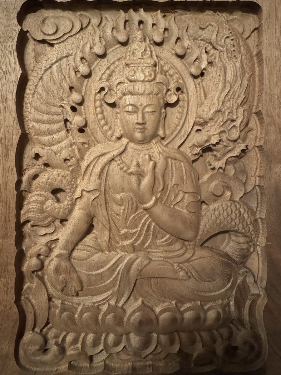 Finished Buddha relief carving in walnut