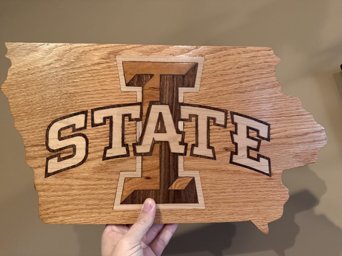 Iowa State I-STATE logo inlaid in walnut, cherry, and maple on an Iowa-shaped oak substrate