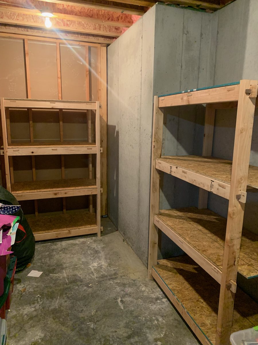 Two heavy-duty shelving units installed in basement