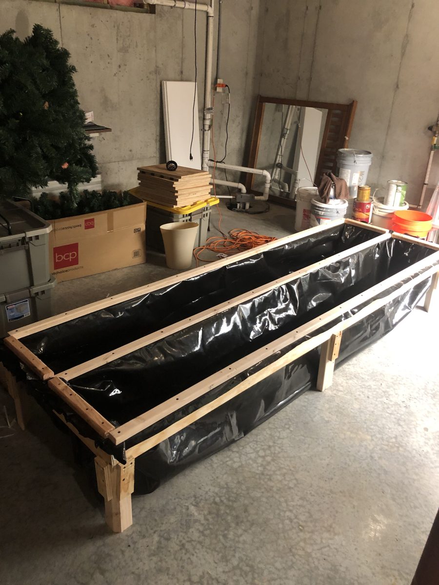 Hydroponic raised bed in garage, wide view