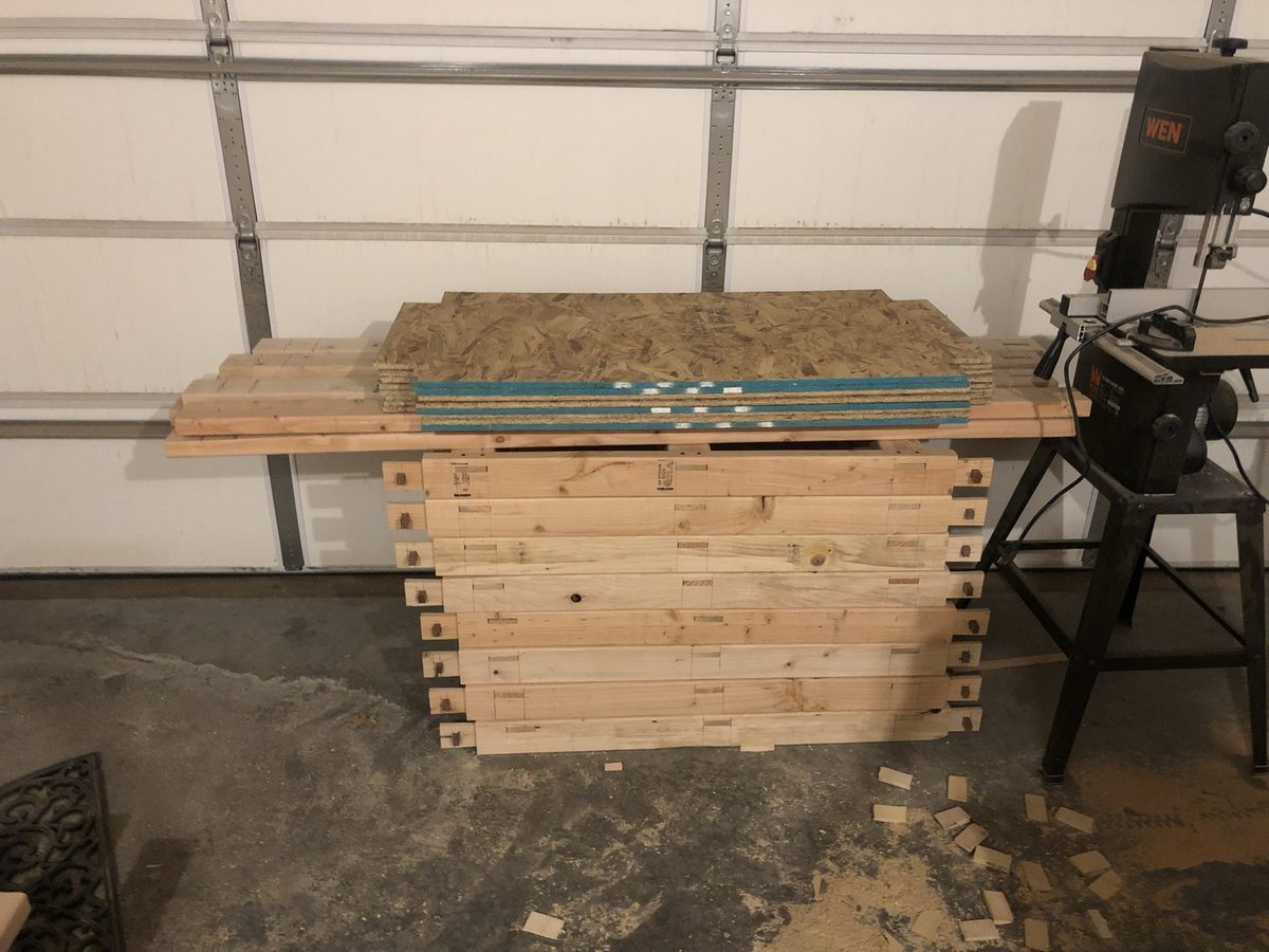 Pine shelf parts stacked with keyed mortise-and-tenon joinery